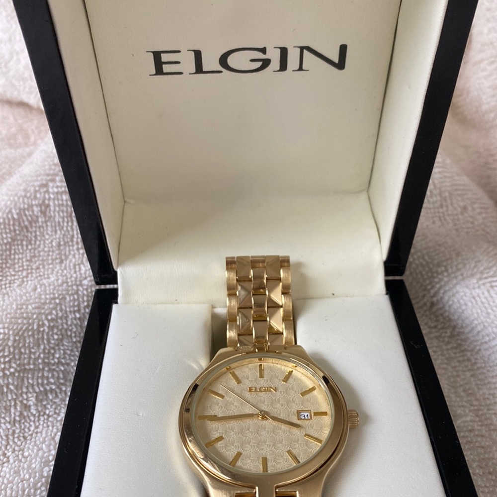 Men’s gold Elgin watch